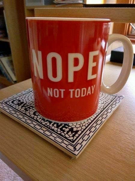 Large tea mug, red with white handle, with words ‘Nope, not today’ on side in white text.